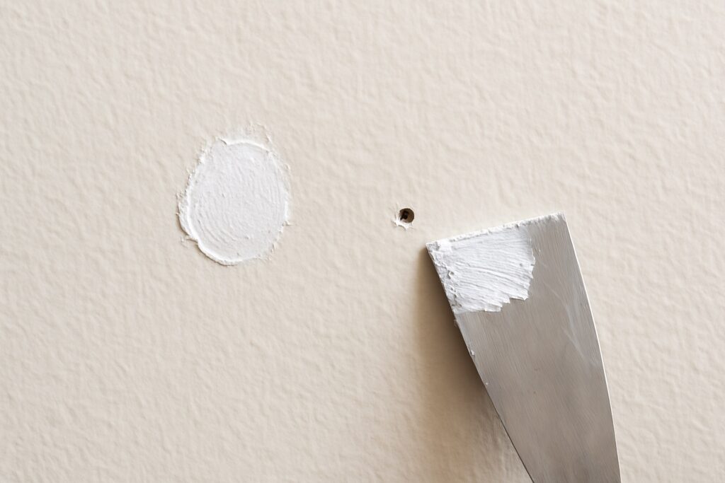 after wall repair paint dries unevenly